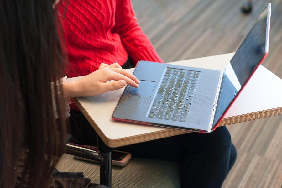 Hands at a laptop